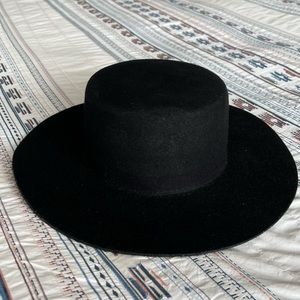 Women’s black Gigipip dahlia style boater hat. ADJUSTABLE. Barely worn